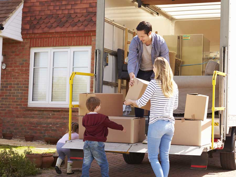 Cross-Country-Movers-Woman-Carrying-Box-2